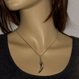 solid 925 silver claw and ball pendant