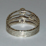blue-violet Tanzanite and textured silver ring back view