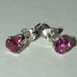 Ruby and silver stud earrings