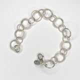 silver chain bracelet, shown unfastened