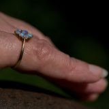 Opal solid 9ct gold ring on finger