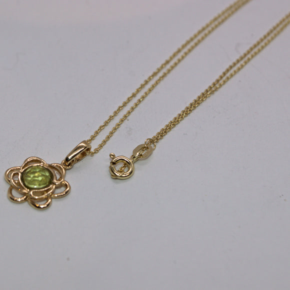 solid 9ct gold and Peridot flower pendant