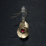 textured gold disc and Garnet earrings