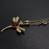 gold dragonfly pendant with Amber stone
