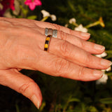 Amber solid silver ring shown on finger