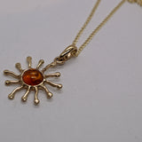 Amber and gold pendant necklace