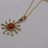 Amber and gold pendant necklace