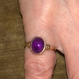 Vintage Amethyst solid 9ct gold ring shown on finger