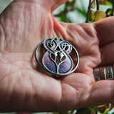 Norman Grant solid silver birds brooch featuring mauve and pink enamel