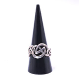 Celtic solid silver knotwork ring shown on display cone