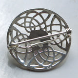 silver Celtic knotwork brooch back view