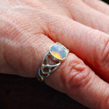 Celtic solid 925 silver and Ethiopian Opal ring shown on finger