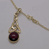 Garnet and 9ct solid gold Celtic pendant