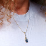 Celtic Lapis Lazuli solid silver pendant necklace shown on model
