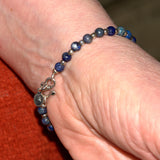 Lapis Lazuli and silver bead bracelet shown on wrist