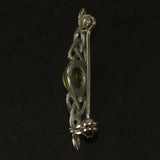 Peridot and silver Celtic style brooch