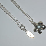Nature silver flower pendant necklace, back view