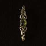 Peridot and silver Celtic style brooch