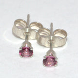 silver stud earrings featuring Pink Topaz