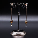 Citrine and solid 925 silver drop earrings on display stand