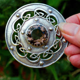 large circular Celtic silver and smokey quartz brooch