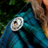 solid silver and smokey quartz Celtic brooch, shown on model