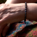 boho bracelet featuring Lapis Lazuli and silver beads shown on wrist