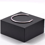 solid sterling silver open bangle shown on gift box