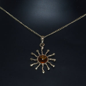 Amber celestial sunburst pendant necklace