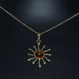 Amber celestial sunburst pendant necklace