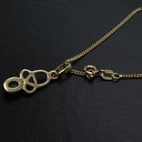 Emerald and solid gold Celtic necklace reverse view