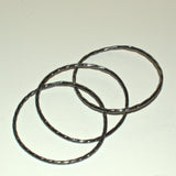 silver interconnected stacking bangles