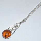 Amber and silver Celtic pendant necklace