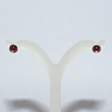 Garnet and silver stud earrings