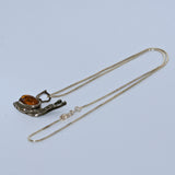 Baltic Amber and silver snail pendant necklace