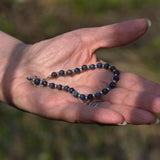 vintage boho Lapis and silver bead bracelet shown in hand