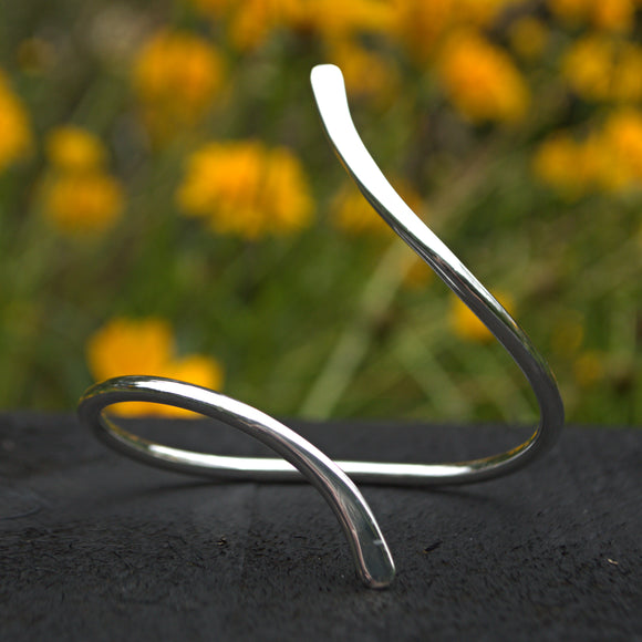 solid silver hand forged curved bangle
