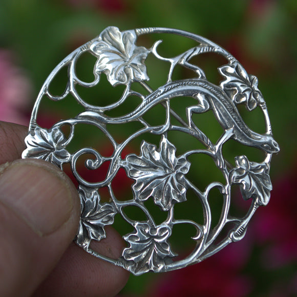silver lizard and leaves circular brooch or pendant
