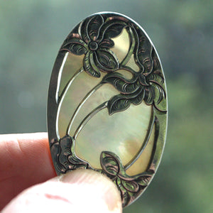 floral silver overlay oval brooch