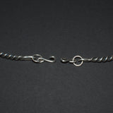 silver curved link necklace shown open