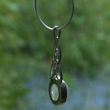 Moonstone pendant, side and open back bezel view