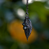 beetle and leaf silver nature pendant 