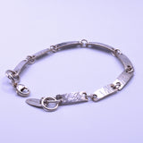 silver textured oblong link bracelet