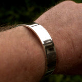 solid silver bangle, on wrist