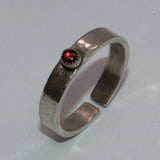 textured silver and Garnet open ring