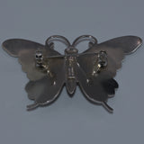 silver butterfly insect brooch, back view