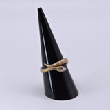 solid silver snake ring on display cone