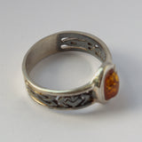 Amber and silver Celtic ring