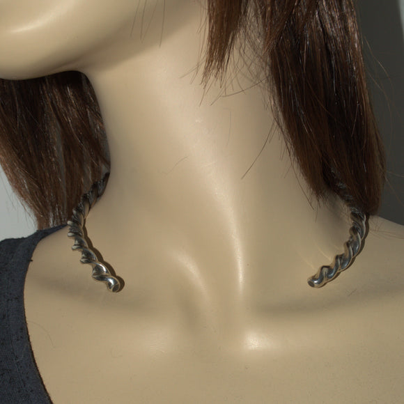 Celtic silver neck ring opening to front