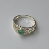 Emerald and silver openwork ring